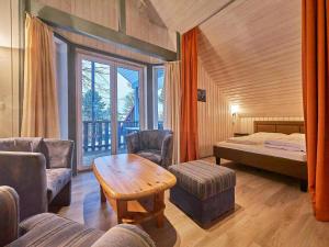 Postel nebo postele na pokoji v ubytování Familienferienhaus in Mirow + 40 fotografií