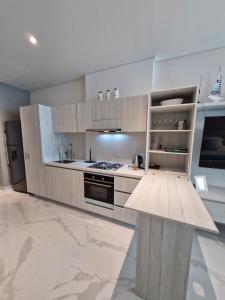 Kuchyň nebo kuchyňský kout v ubytování Apartamento Luxury en Süi Lofts