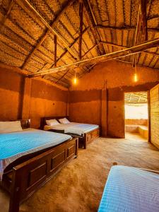 Postel nebo postele na pokoji v ubytování Thanamal-villa + 87 fotografií