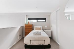 Katil atau katil-katil dalam bilik di Parkview - Mount Maunganui