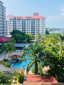 an aerial view of a resort with a swimming pool at Homestay FA Seaview in Port Dickson