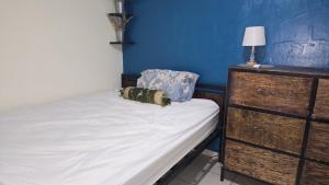 Giường trong phòng chung tại Hostal Casa de Elena