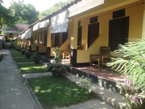 ลานเฉลียงหรือพื้นที่กลางแจ้งของ Diyah Homestay