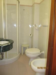 Koupelna v ubytování Hotel Sirena