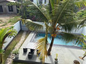 Πισίνα στο ή κοντά στο Villa Leo hikkaduwa