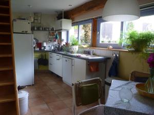 Virtuvė arba virtuvėlė apgyvendinimo įstaigoje Gite Sent Martin
