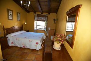 Postel nebo postele na pokoji v ubytování Hotel Enrique Calvillo