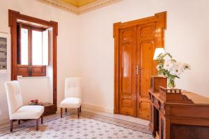 Posedenie v ubytovaní Palazzo Montalbano