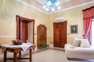Posedenie v ubytovaní Palazzo Montalbano