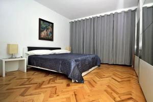 Postel nebo postele na pokoji v ubytování Luxury Apartment Brela