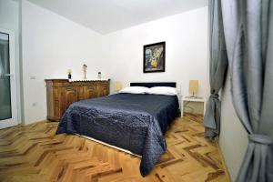 Postel nebo postele na pokoji v ubytování Luxury Apartment Brela