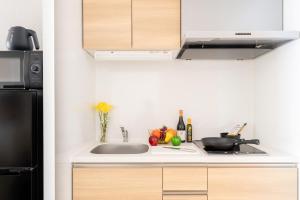Kuchyň nebo kuchyňský kout v ubytování Regale Namba