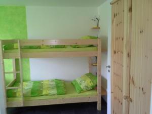 Postel nebo postele na pokoji v ubytování Apartmán Hastrmánek, Kvilda 3