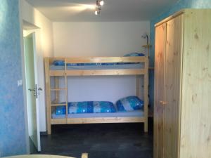 Postel nebo postele na pokoji v ubytování Apartmán Hastrmánek, Kvilda 3