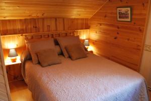 Postel nebo postele na pokoji v ubytování Gîte Des Sapins