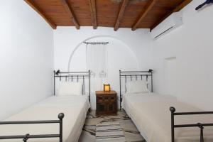 Ліжко або ліжка в номері spitakia naxos