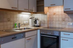 Kuchyň nebo kuchyňský kout v ubytování Eckis Appartements