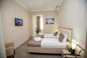 Letto o letti in una camera di Rustaveli Palace