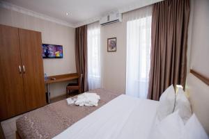 Letto o letti in una camera di Rustaveli Palace