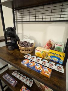 a table with cookies and other food on it at Casa Roma in Domusnovas