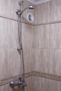 Ένα μπάνιο στο Beach Apartment MELINA