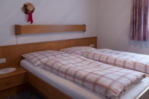 Postel nebo postele na pokoji v ubytování Eckis Appartements