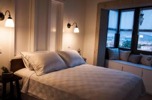 Postel nebo postele na pokoji v ubytování Sakula Hotel