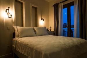 Postel nebo postele na pokoji v ubytování Sakula Hotel