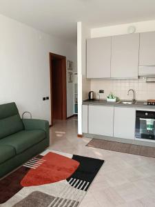 Η κουζίνα ή μικρή κουζίνα στο Bilocale con Terrazzo e BOX AUTO su Richiesta