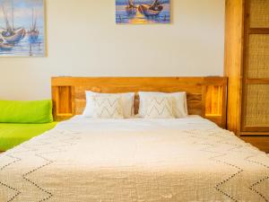 Ένα ή περισσότερα κρεβάτια σε δωμάτιο στο Room in Mengwi