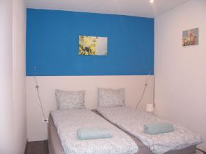 Postel nebo postele na pokoji v ubytování Budapest Trinity Homes