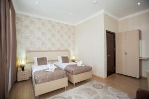 Letto o letti in una camera di Rustaveli Palace