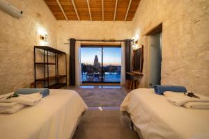 Ένα ή περισσότερα κρεβάτια σε δωμάτιο στο Eco Villa Su +24 φωτογραφίες