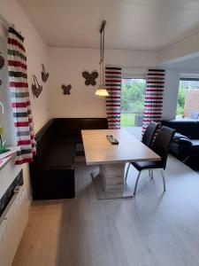 Posezení v ubytování Ferienhaus Sander + 9 fotografií
