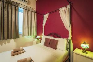 Ένα ή περισσότερα κρεβάτια σε δωμάτιο στο Charming 2-Bedroom in the Heart of La Valletta