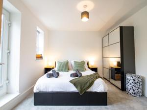 En eller flere senge i et værelse på Pass the Keys Turners Nook