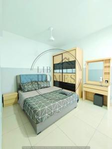 a bedroom with a large bed and a window at Razak City Residence at Sungai Besi, Kuala Lumpur by Liberty Homes in Kuala Lumpur