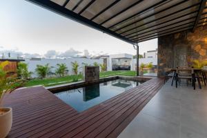 an external view of a house with a swimming pool at Mauritius in Midlands Station