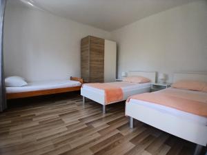 Katil atau katil-katil dalam bilik di Apartment Luka