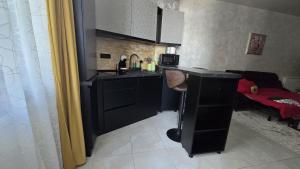 Køkken eller tekøkken på BreakFree at Azimuth Building Stefan