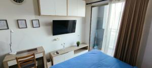 TV a/nebo společenská místnost v ubytování Springwood serene stay Cozy Studio