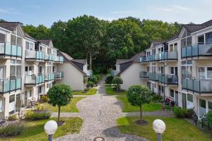 an aerial view of a courtyard of apartment buildings at Apartmentanlage Eldena Ferienwohnung 10 in Lobbe
