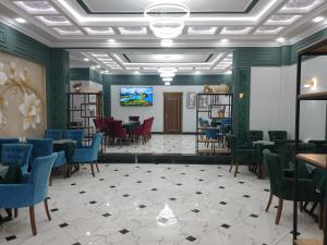 Μια τηλεόραση ή/και κέντρο ψυχαγωγίας στο Jayhun Hotel Urgench