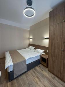 Ένα ή περισσότερα κρεβάτια σε δωμάτιο στο Crystal Resort Room 310