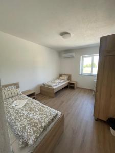 Postel nebo postele na pokoji v ubytování VP sobe