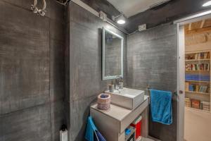 a bathroom with a sink and a mirror at San Leonardo Apartments in Lecce +23 photos