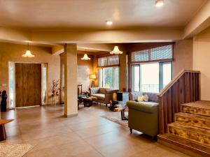 Coin salon dans l'établissement The Terraces - Kanatal