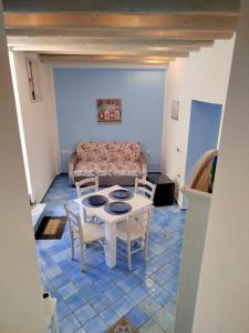 Posezení v ubytování Le Mura Home