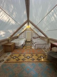 Postel nebo postele na pokoji v ubytování Domaine du Fourtet