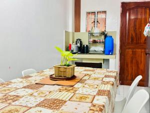 a dining room table with a table cloth on it at 2BR Apartment in Candon City in Darapidap